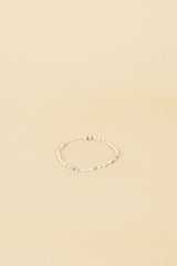 Bracelet Kari en or 14 carats avec incrustation de perle blanche et pierre Mano blanche