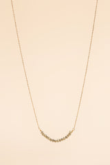 Collier Osja avec incrustation en or 14 carats et cristal vert