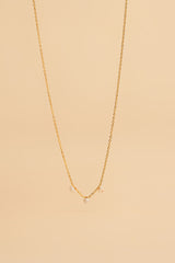 Collier en perle blanche avec incrustation en or 14 carats Jouta