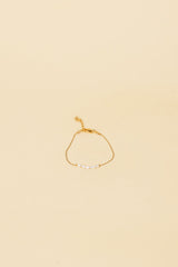 Bracelet Osja en or 14 carats avec incrustation de perles blanches