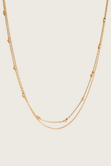 Collier en cristal pêche avec incrustation en or 14 carats